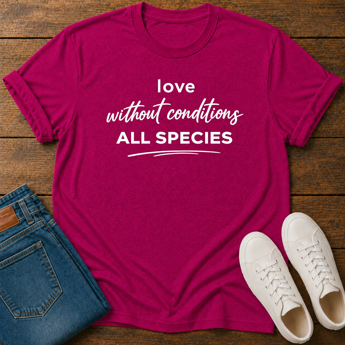 Pink t-shirt with text 'love without conditions all species'