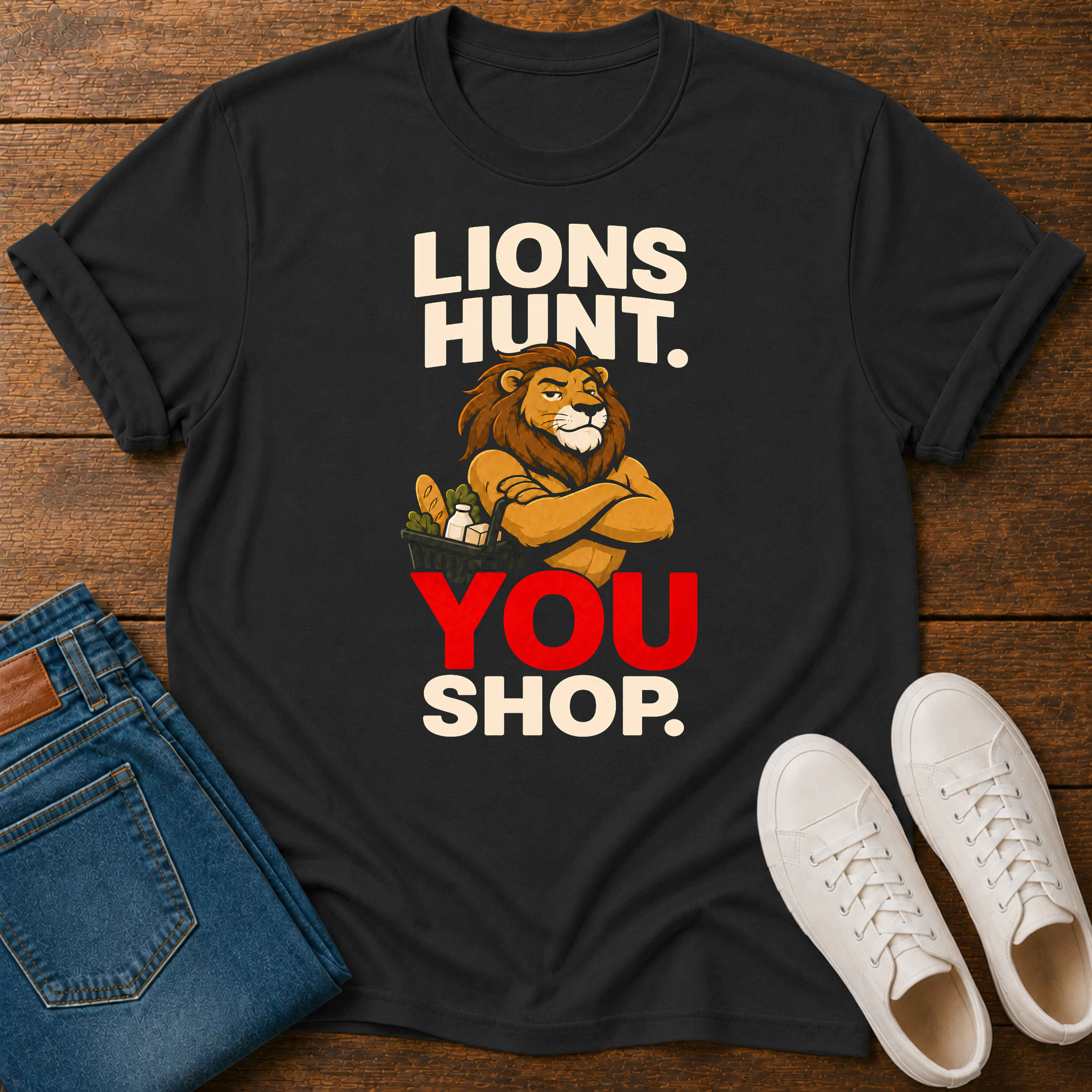 Black T-Shirt with graphic of a lion shopping and text 'lions hunt you shop' Vegan graphic T-Shirt