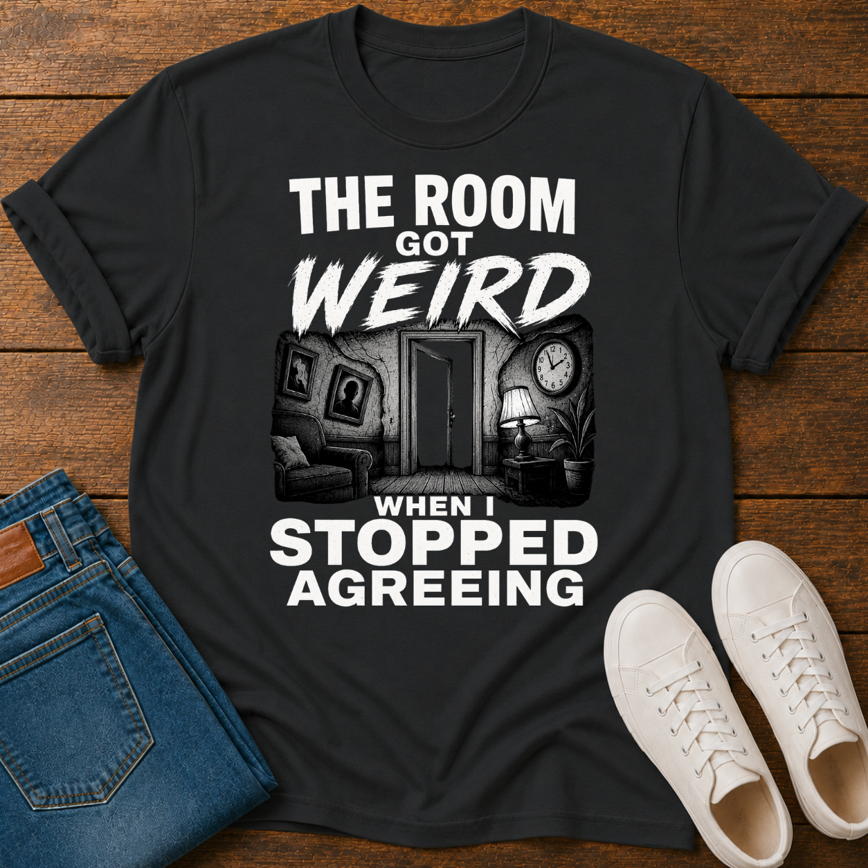 Black T-Shirt with text 'the room got weird when i stopped agreeing'