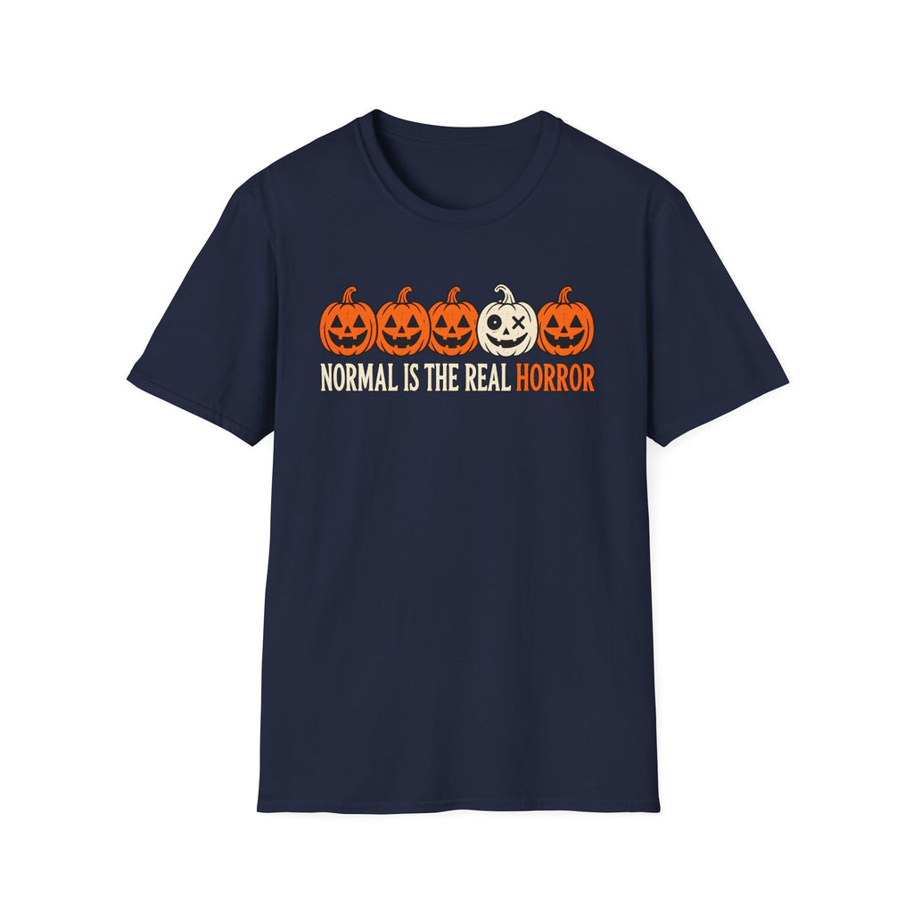 Navy Graphic T-shirt design featuring five jack-o’-lanterns, with one white mismatched pumpkin standing out from four orange pumpkins, above the words “Normal Is the Real Horror.”