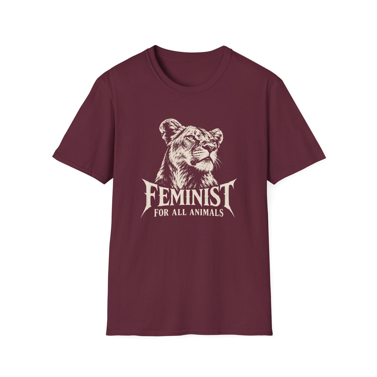 A maroon short-sleeve crewneck t-shirt featuring a cream graphic of a lioness head with the text 'FEMINIST FOR ALL ANIMALS' printed on the front, displayed against a solid white background.