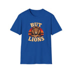 A royal blue short-sleeve crewneck t-shirt featuring a retro-style graphic of a lion with the text 'BUT LIONS' in a warm beige and orange gradient, set against a plain white background.