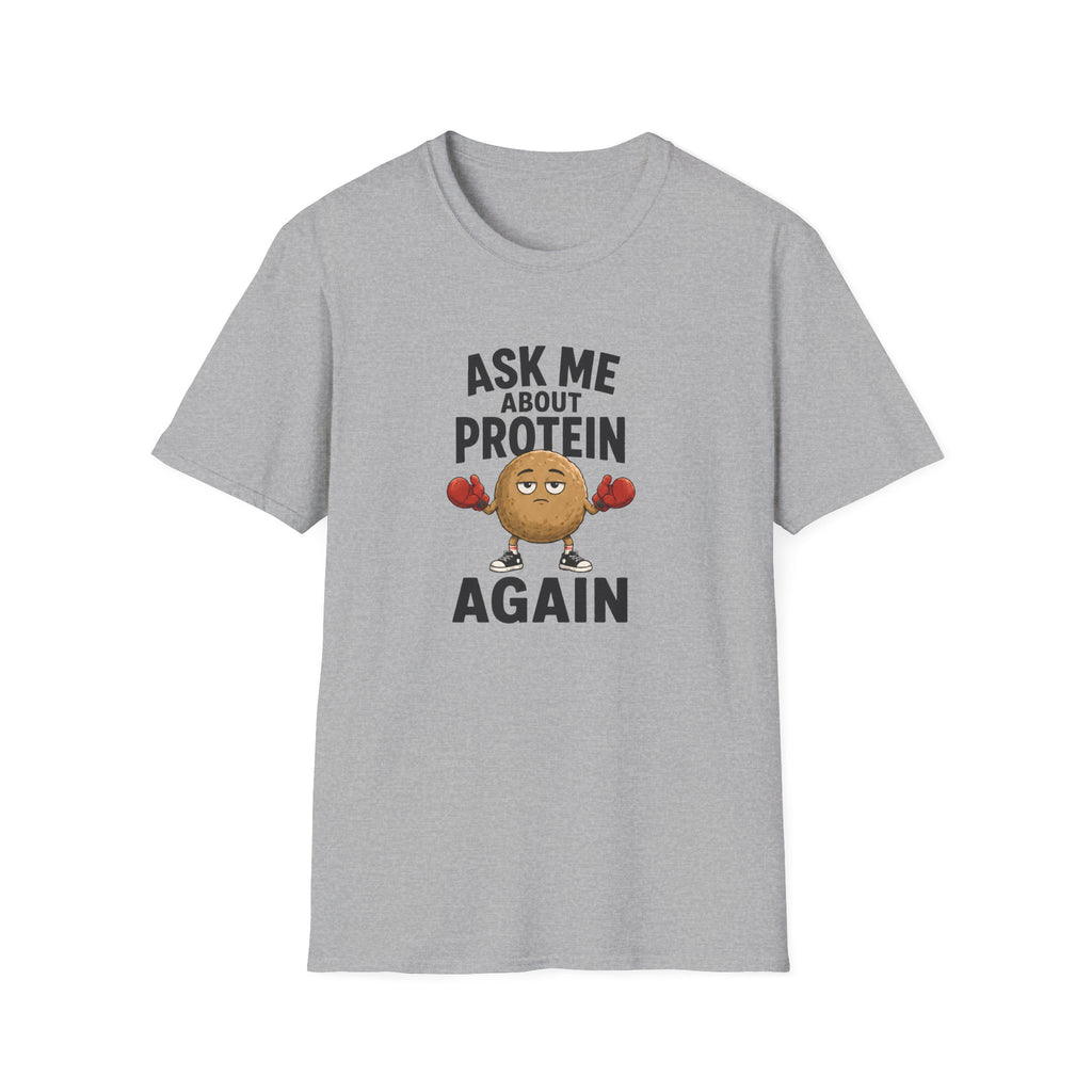 A light gray heather crewneck t-shirt featuring a graphic print of a cartoon protein powder bag character wearing red boxing gloves, with the text 'ASK ME ABOUT PROTEIN AGAIN' in black.