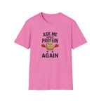 Pink t-shirt with cartoon graphic and text 'ask me about protein again'