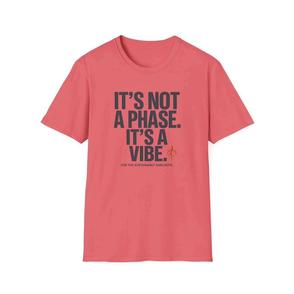 A coral pink short-sleeve t-shirt with a dark gray text graphic reading 'IT'S NOT A PHASE. IT'S A VIBE.