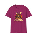 A heathered magenta short-sleeve t-shirt with a graphic of a lion's face and the text 'BUT LIONS' in a retro cream font, set against a plain white background.