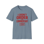 A light blue crewneck t-shirt with a red graphic text print reading 'I DIDN'T ORDER THE COMMENTARY' and a 'COMMENTS CLOSED' stamp graphic, shown on a plain white background.