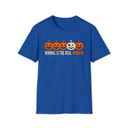 royal blue Graphic T-shirt design featuring five jack-o’-lanterns, with one white mismatched pumpkin standing out from four orange pumpkins, above the words “Normal Is the Real Horror.”