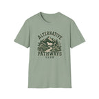 A sage green short-sleeve crewneck t-shirt with a vintage-style dark green graphic on the chest reading 'ALTERNATIVE PATHWAYS CLUB' with a mountain and foliage illustration, shown on a plain white background.