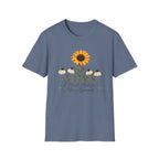 Blue graphic T-shirt featuring a bright yellow sunflower above four drooping cream flowers with I Wasn't Made for Mass Approval in cursive text.