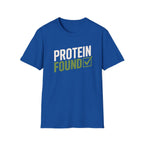 Blue t-shirt with 'PROTEIN FOUND' text on a white background