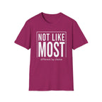 Magenta t-shirt with white text 'NOT LIKE MOST different by choice' on a white background