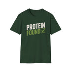 Forest green t-shirt with 'PROTEIN FOUND' text on a white background