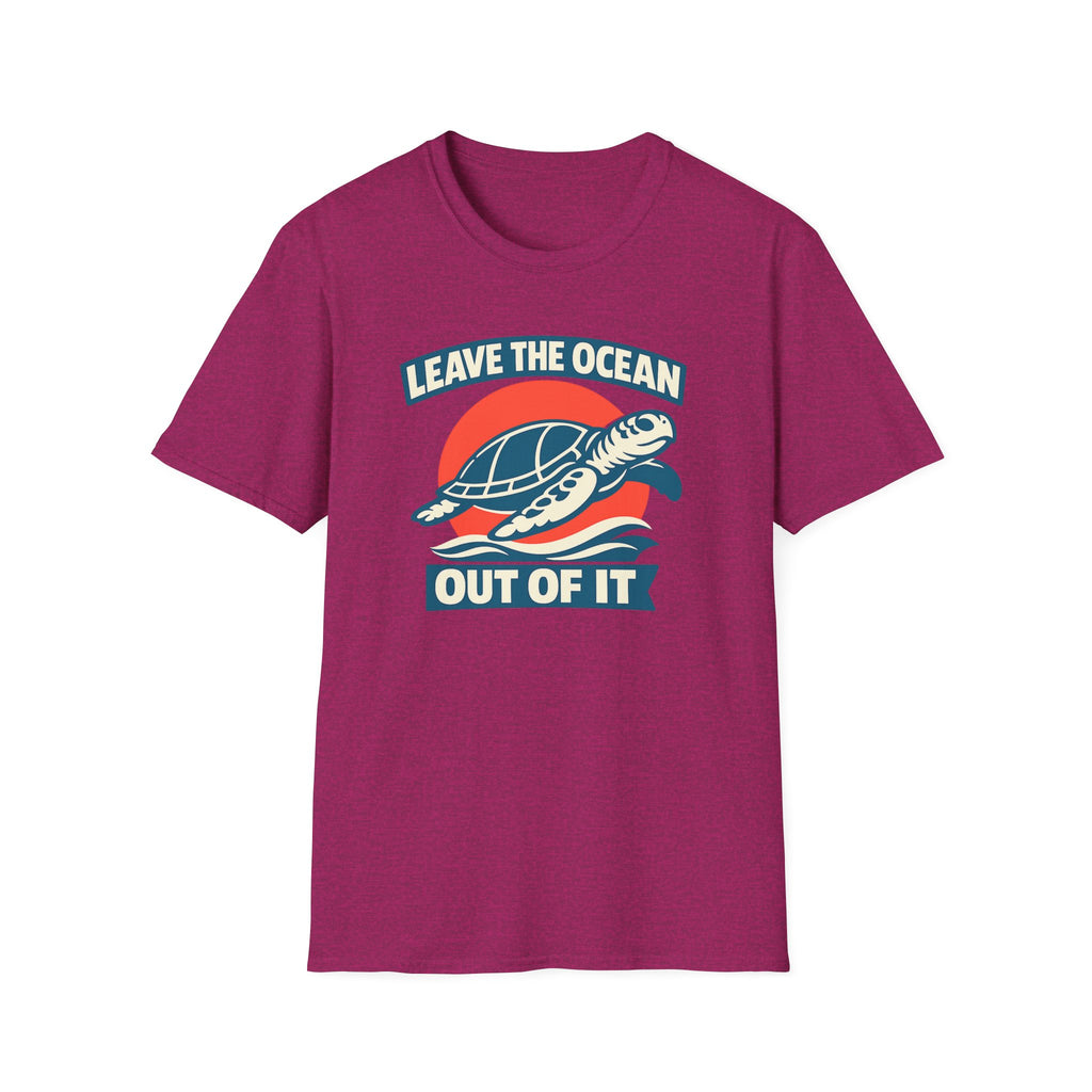 Pink short-sleeve crewneck t-shirt featuring a graphic print of a sea turtle swimming over blue waves in front of a red sun, with the text 'LEAVE THE OCEAN OUT OF IT' in white and blue.
