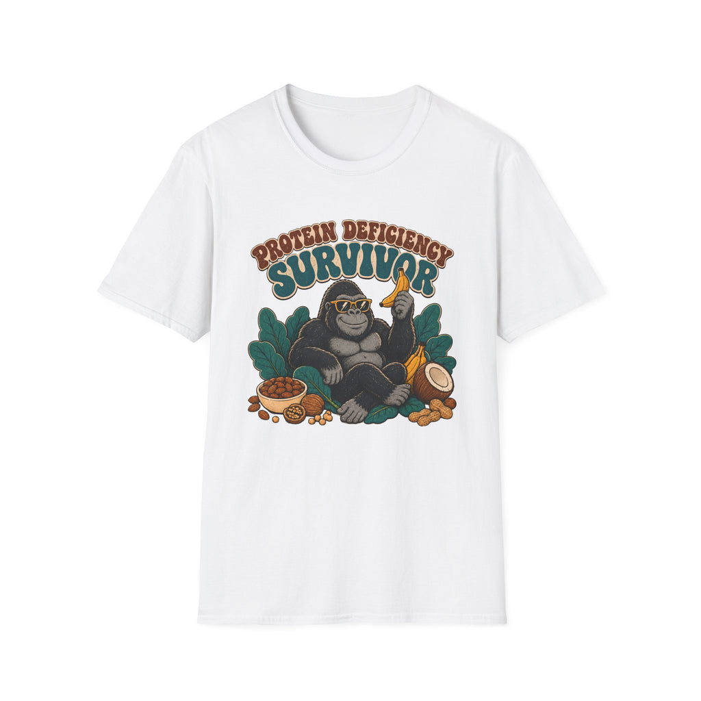 A white short-sleeve crewneck t-shirt featuring a retro-style graphic of a gorilla wearing sunglasses and holding a banana, surrounded by leaves and food items, with the text 'PROTEIN DEFICENCY SURVIVOR' above it.