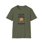 Military green t-shirt with cartoon graphic and text 'ask me about protein again'