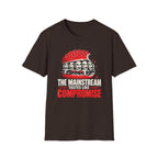 A dark brown short-sleeve t-shirt with a graphic print of a burger with teeth and the text 'THE MAINSTREAM TASTES LIKE COMPROMISE' in white and red, displayed on a solid white background.