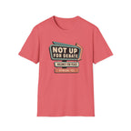 A coral pink short-sleeve t-shirt with a retro-style political graphic on the chest reading 'NOT UP FOR DEBATE', 'VACANCY FOR PEACE', and 'OPINIONS FULL'.