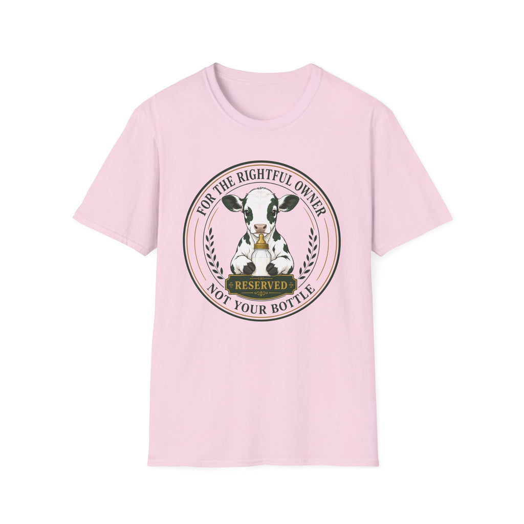 A light pink short-sleeve crewneck t-shirt featuring a circular graphic print of a black and white cow with a bell and the text 'FOR THE RIGHTFUL OWNER NOT YOUR BOTTLE' and 'RESERVED'.