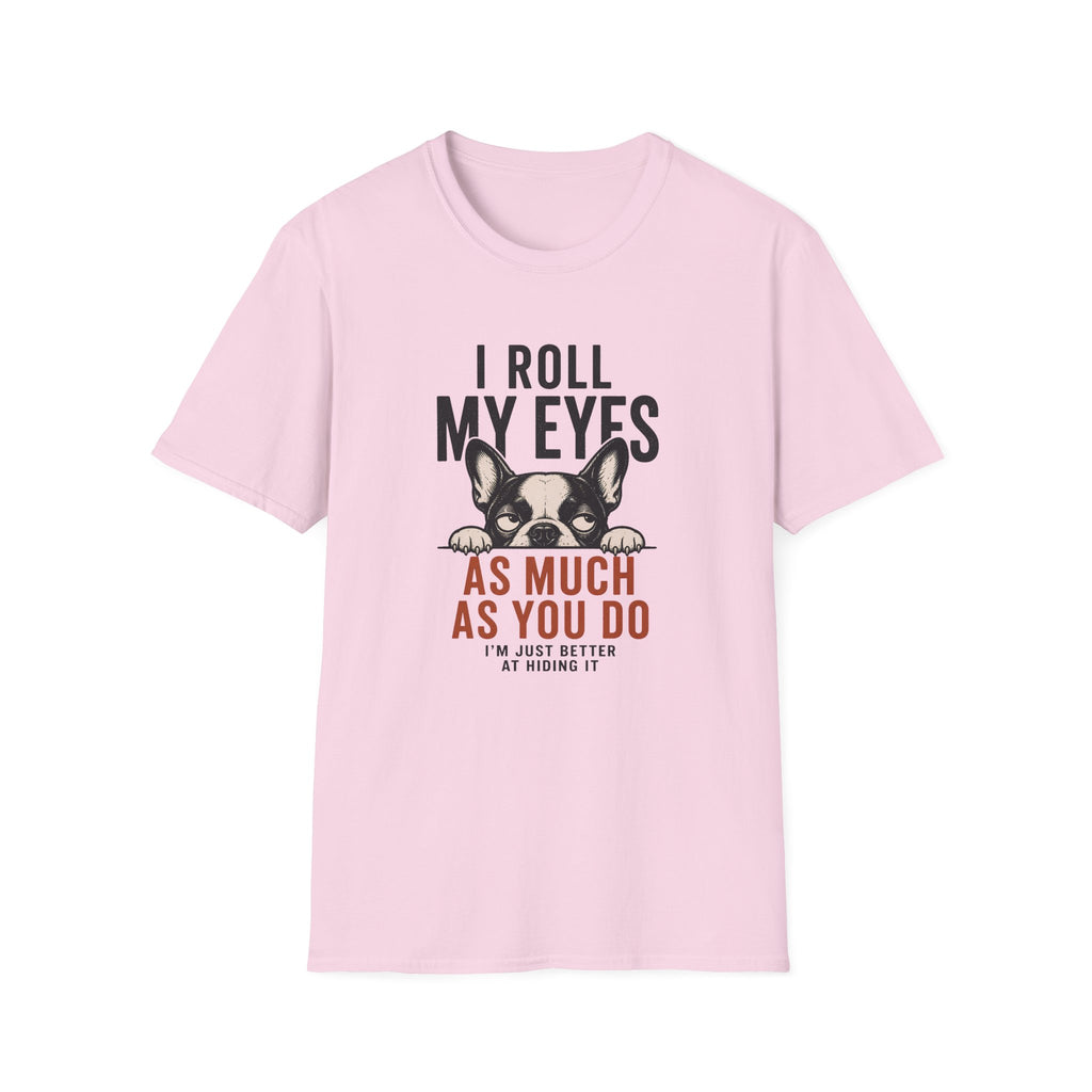 A light pink short-sleeve crewneck t-shirt featuring a graphic print of a French Bulldog with the text 'I ROLL MY EYES AS MUCH AS YOU DO I'M JUST BETTER AT HIDING IT' in black and reddish-brown lettering.