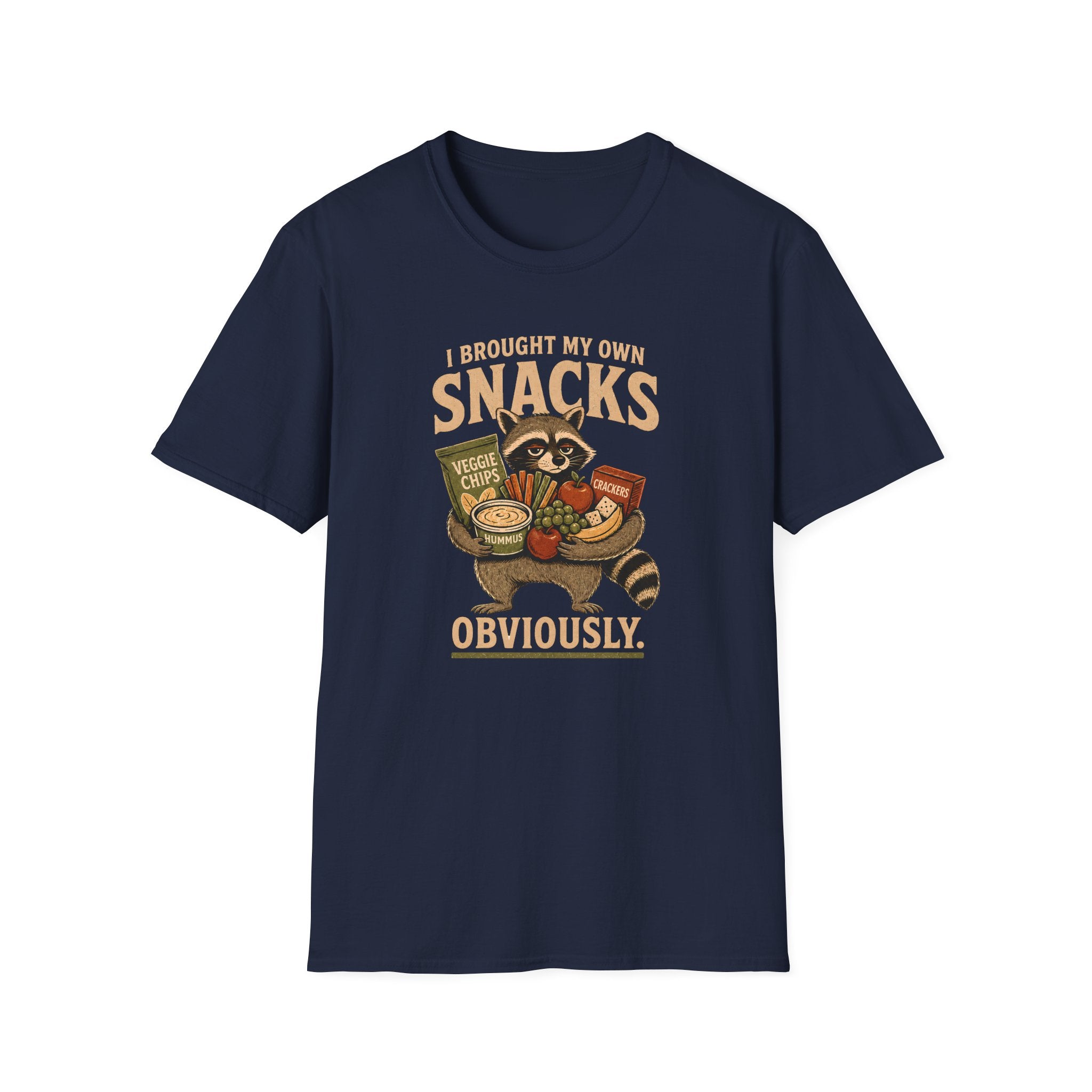 A navy blue short-sleeve crewneck t-shirt featuring a vintage-style graphic of a raccoon holding a basket of snacks with the text 'I BROUGHT MY OWN SNACKS OBVIOUSLY.' printed on the front.