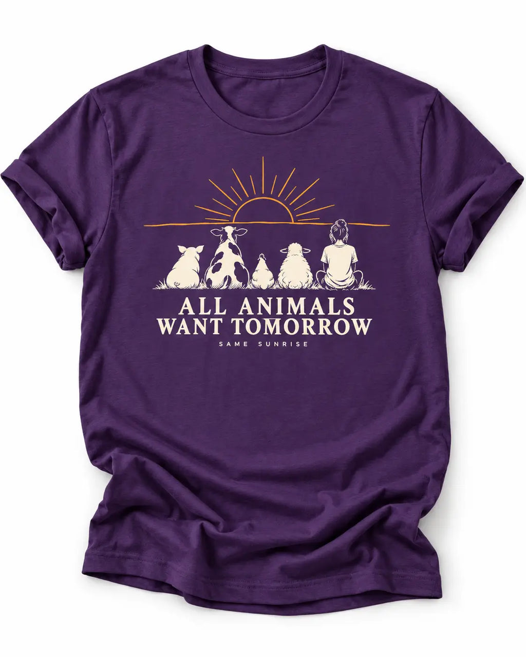 Purple graphic T-shirt featuring a pig, cow, chicken, sheep and person sitting beneath a sunrise with the words “All Animals Want Tomorrow” and “Same Sunrise.”
