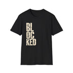 A black short-sleeve crewneck t-shirt featuring the word 'BLOCKED' printed vertically on the front in a distressed beige font, shown against a plain white background.