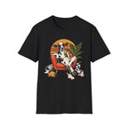 A black short-sleeve crewneck t-shirt featuring a colorful graphic print of a cow lounging in an orange armchair against a sunset background.