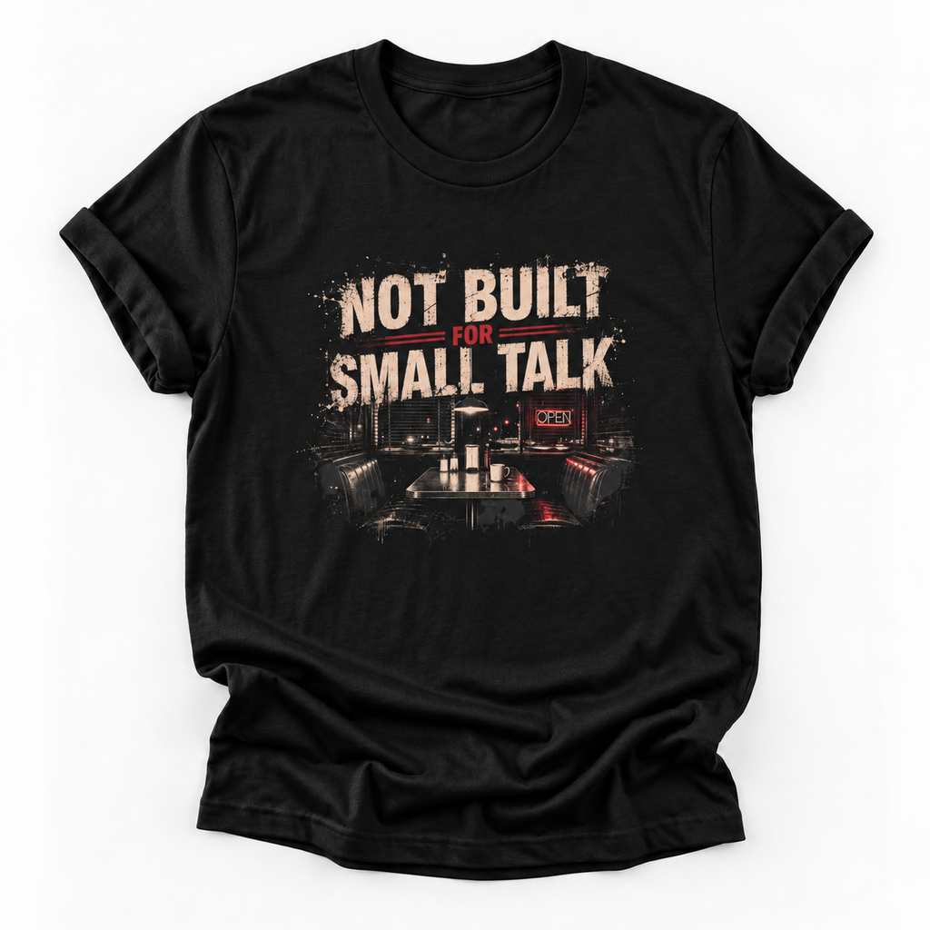 A black short-sleeve crewneck t-shirt with a distressed graphic on the front that reads 'NOT BUILT FOR SMALL. TALK' in beige and red, above a dark industrial scene with a small red 'MTR' sign.