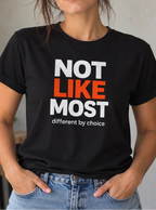 Woman wearing a black t-shirt with the text 'not like most different by choice'