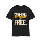 A black short-sleeve crewneck t-shirt with a bold text graphic on the chest reading 'CAGE-FREE ISN'T THE SAME AS FREE.' in cream and mustard yellow lettering, displayed against a solid white background.