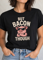 Woman wearing a black activist tee with a pig graphic and text 'but bacon though'