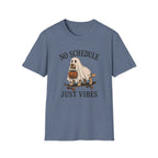 Blue t-shirt with dog on a skateboard halloween graphic and text 'no schedule just vibes'