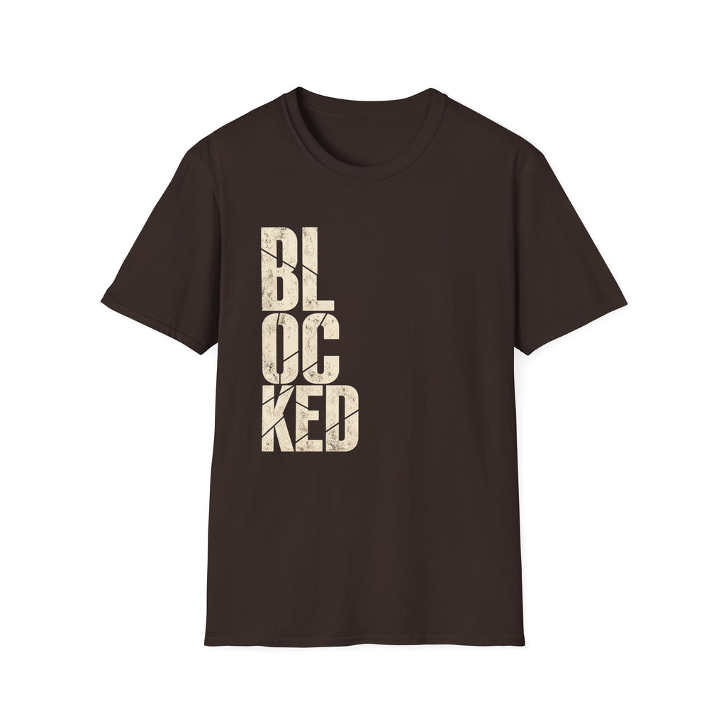 A brown short-sleeve crewneck t-shirt featuring the word 'BLOCKED' printed vertically on the front in a distressed beige font, shown against a plain white background.