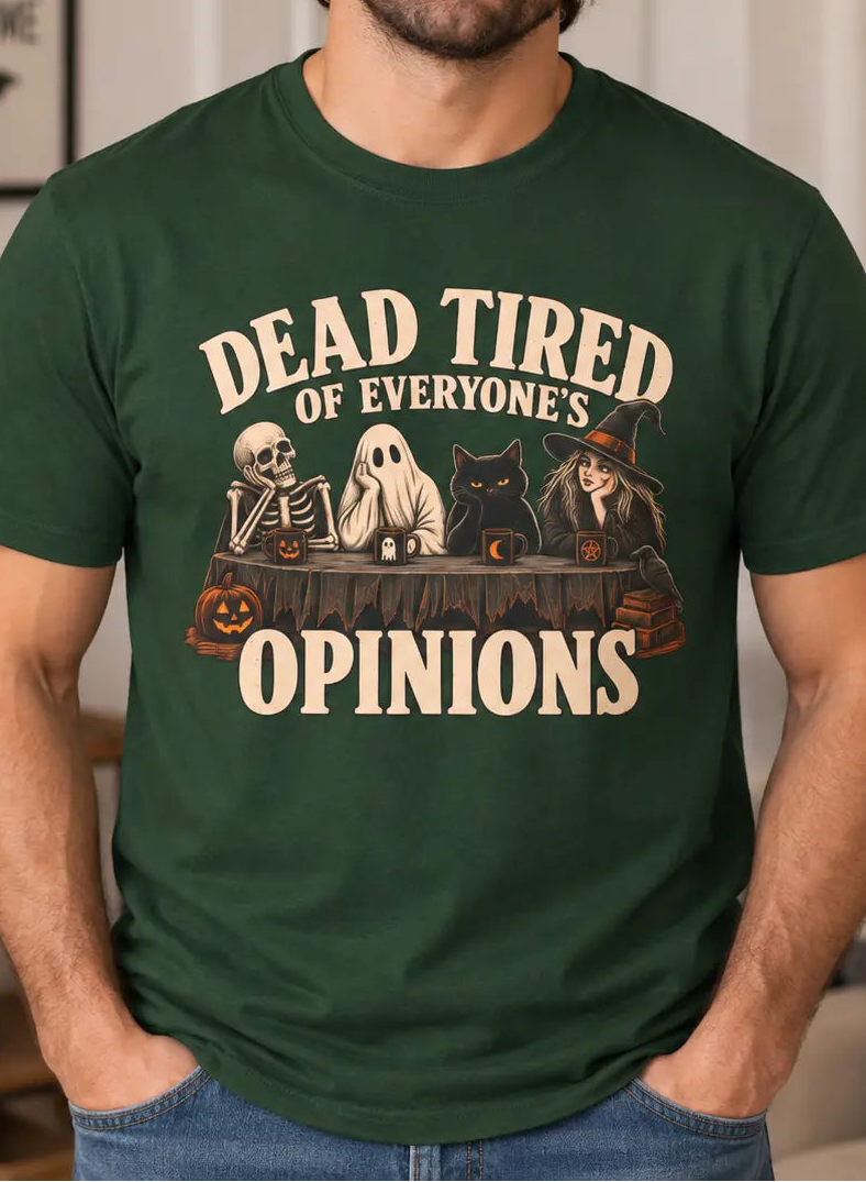 Man wearing a green halloween t-shirt with text 'dead tired of everyone's opinions'