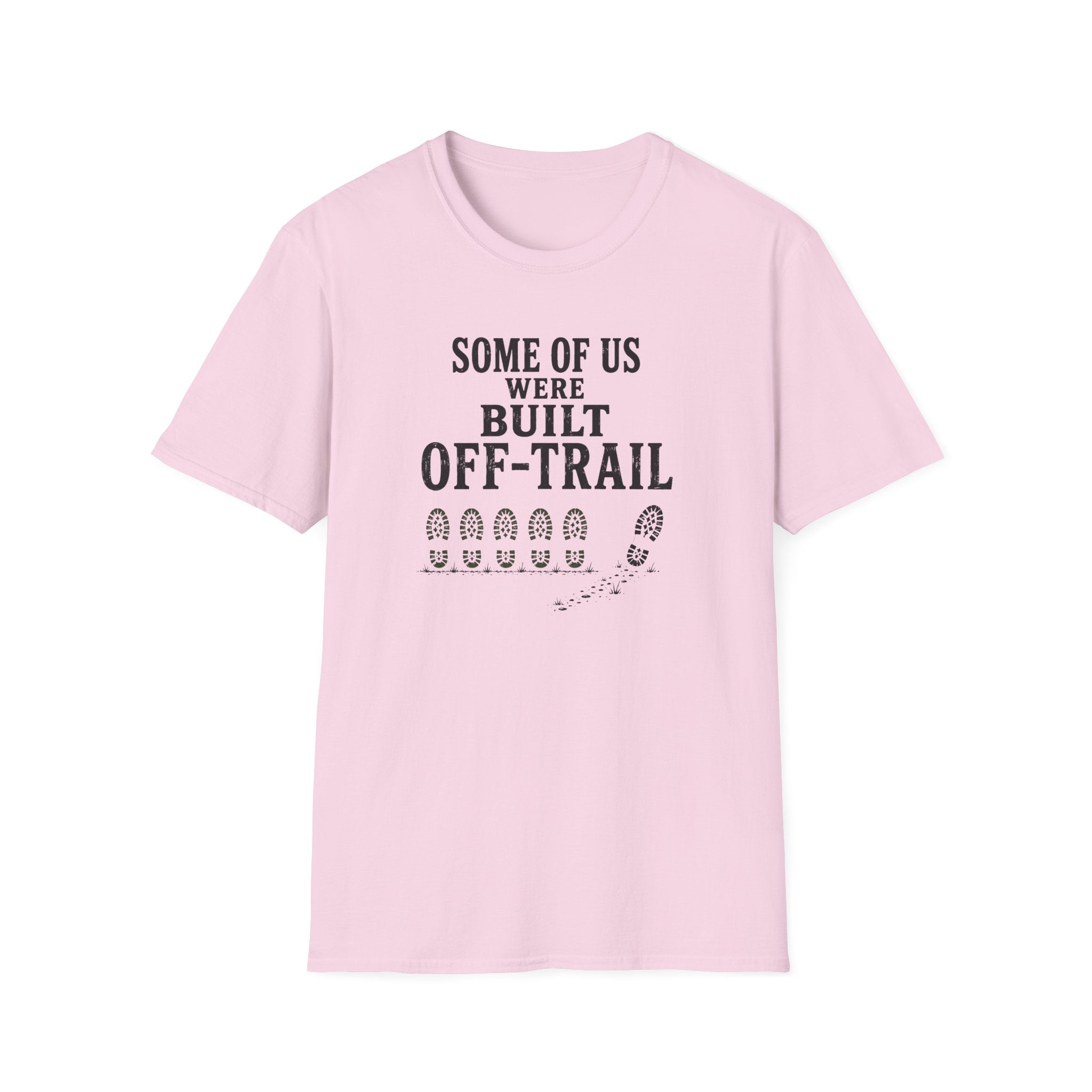 A light pink short-sleeve crewneck t-shirt with a black graphic print on the front that reads 'SOME OF US WERE BUILT OFF-TRAIL' above a row of boot prints and a trail graphic.