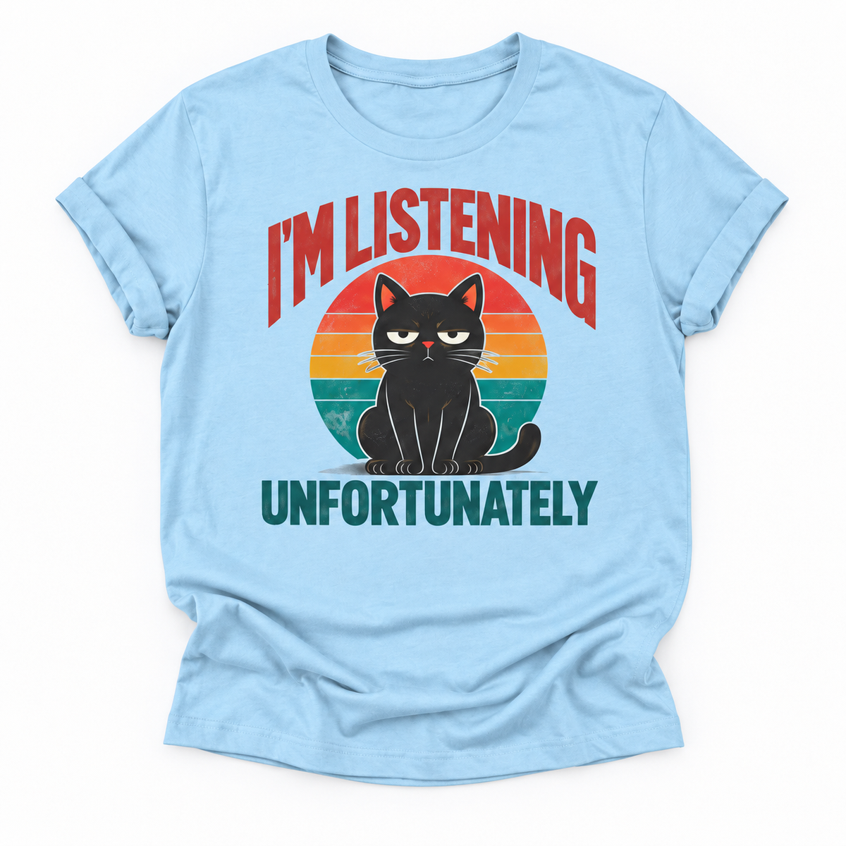 A light blue short-sleeve t-shirt with a graphic of a black cat sitting in front of a retro sunset circle. The text reads 'I'M LISTENING' in red above the cat and 'UNFORTUNATELY' in dark teal below it.