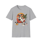 Light grey short-sleeve crewneck t-shirt featuring a colorful graphic print of a cow lounging in an orange armchair against a sunset background.