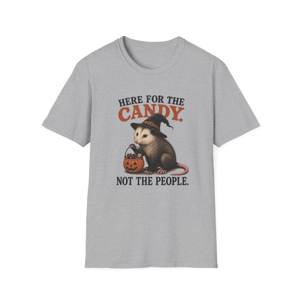 A light heather gray short-sleeve crewneck t-shirt featuring a Halloween graphic of an opossum wearing a witch hat and holding a jack-o'-lantern with the text 'HERE FOR THE CANDY. NOT THE PEOPLE.