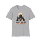 A heather gray short-sleeve crewneck t-shirt featuring a Halloween graphic of a haunted house, bats, and three dogs under a full moon, with the text 'HAUNT HOUSES NOT ANIMALS' printed below.