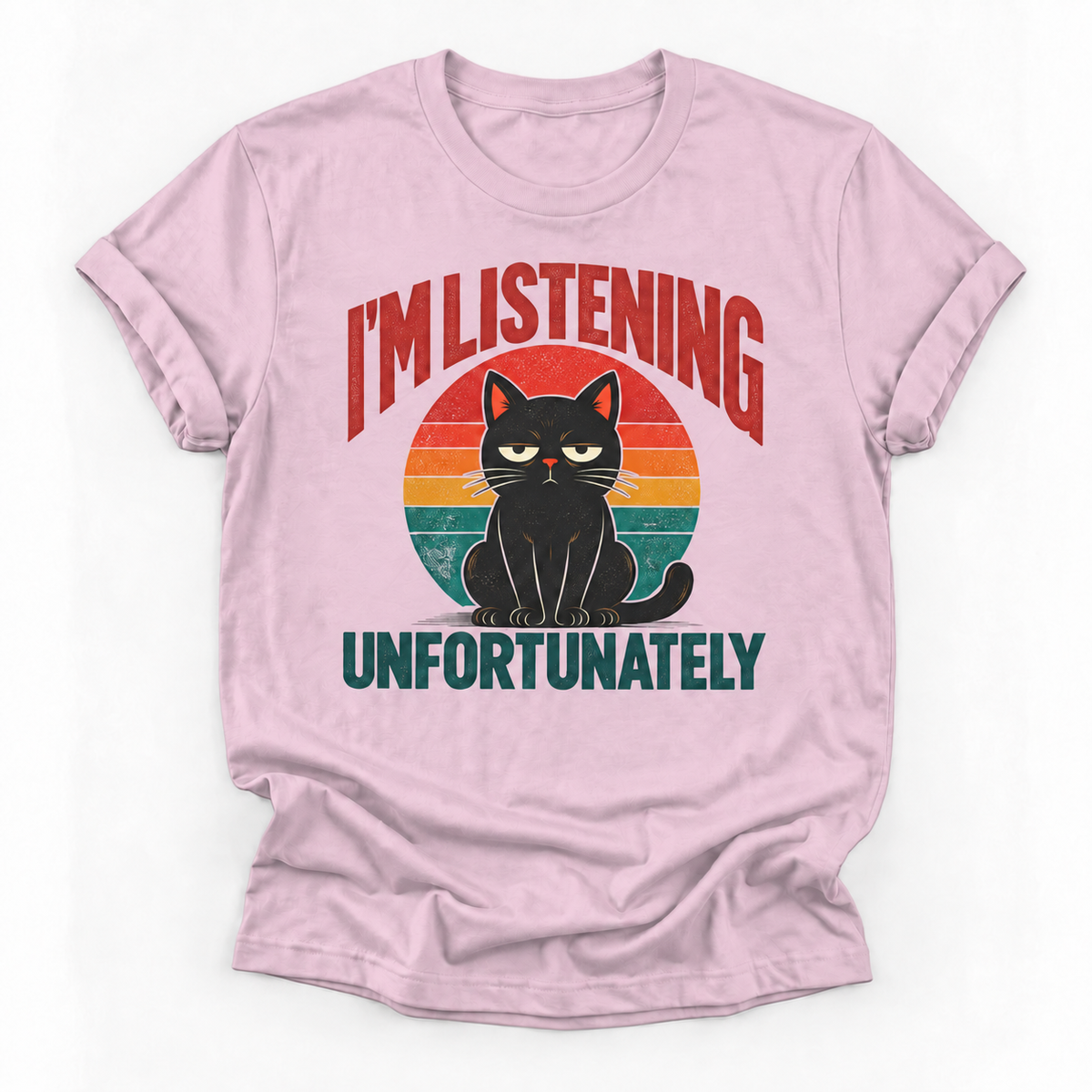 A light pink short-sleeve t-shirt with a graphic of a black cat in front of a retro sunset circle. The text reads 'I'M LISTENING' in red above the cat and 'UNFORTUNATELY' in dark teal below it.