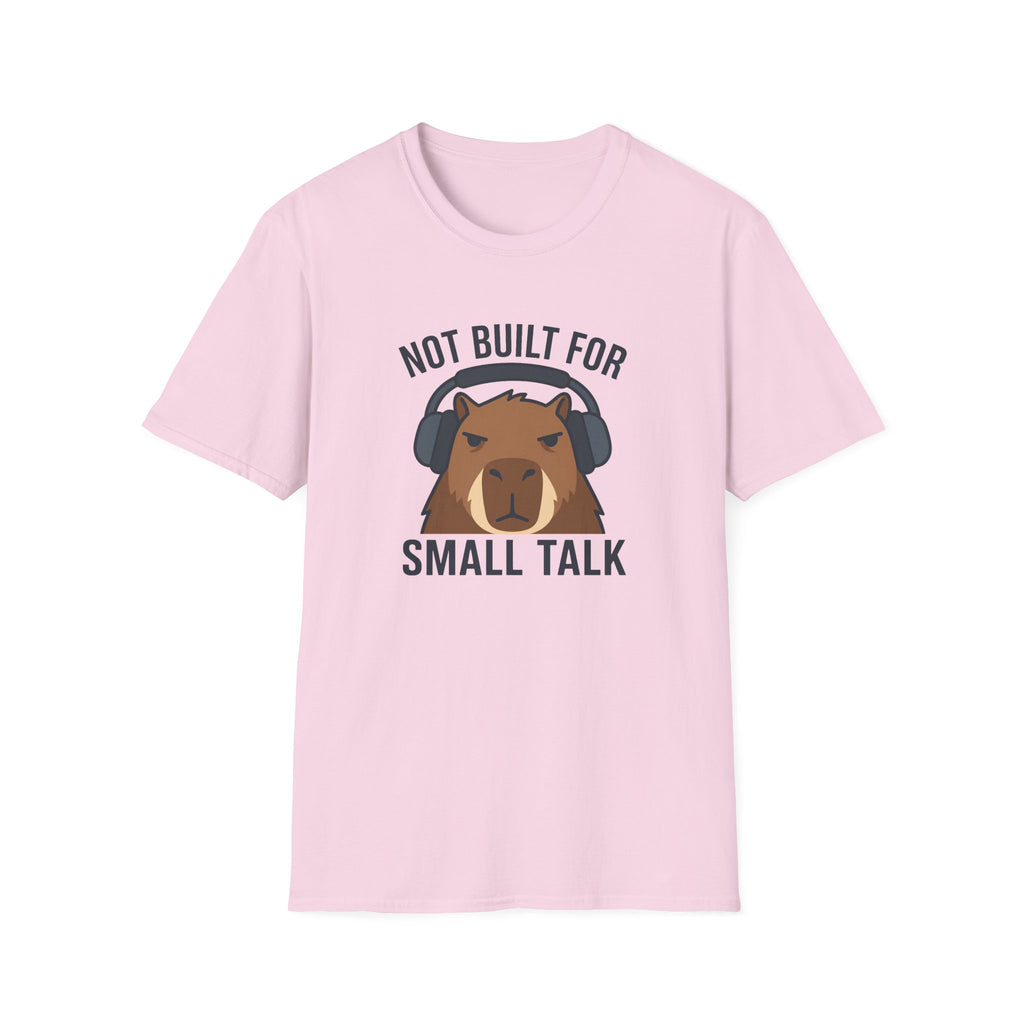 Light pink t-shirt with image of a capybara wearing headphones and text 'not built for small talk'