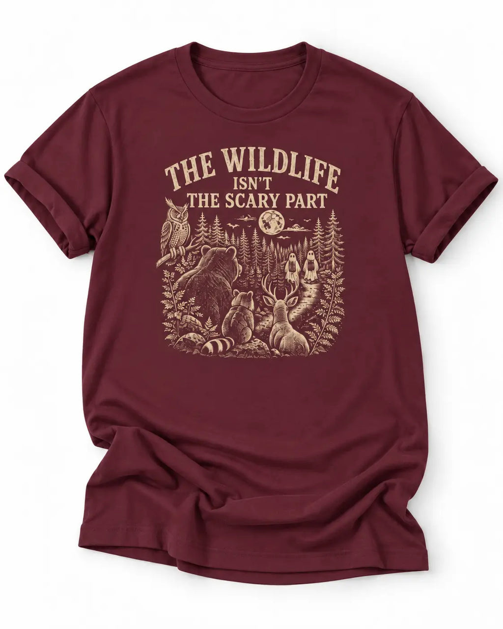 Maroon t-shirt with nature graphic of animals and halloween characters walking up a path and text 'the wildlife isn;t the scary part