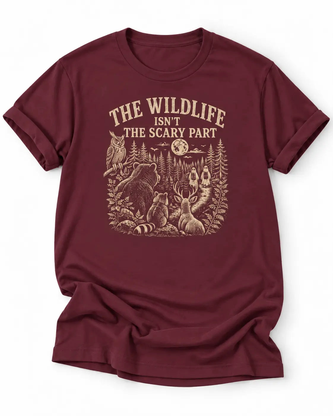 Maroon t-shirt with nature graphic of animals and halloween characters walking up a path and text 'the wildlife isn;t the scary part
