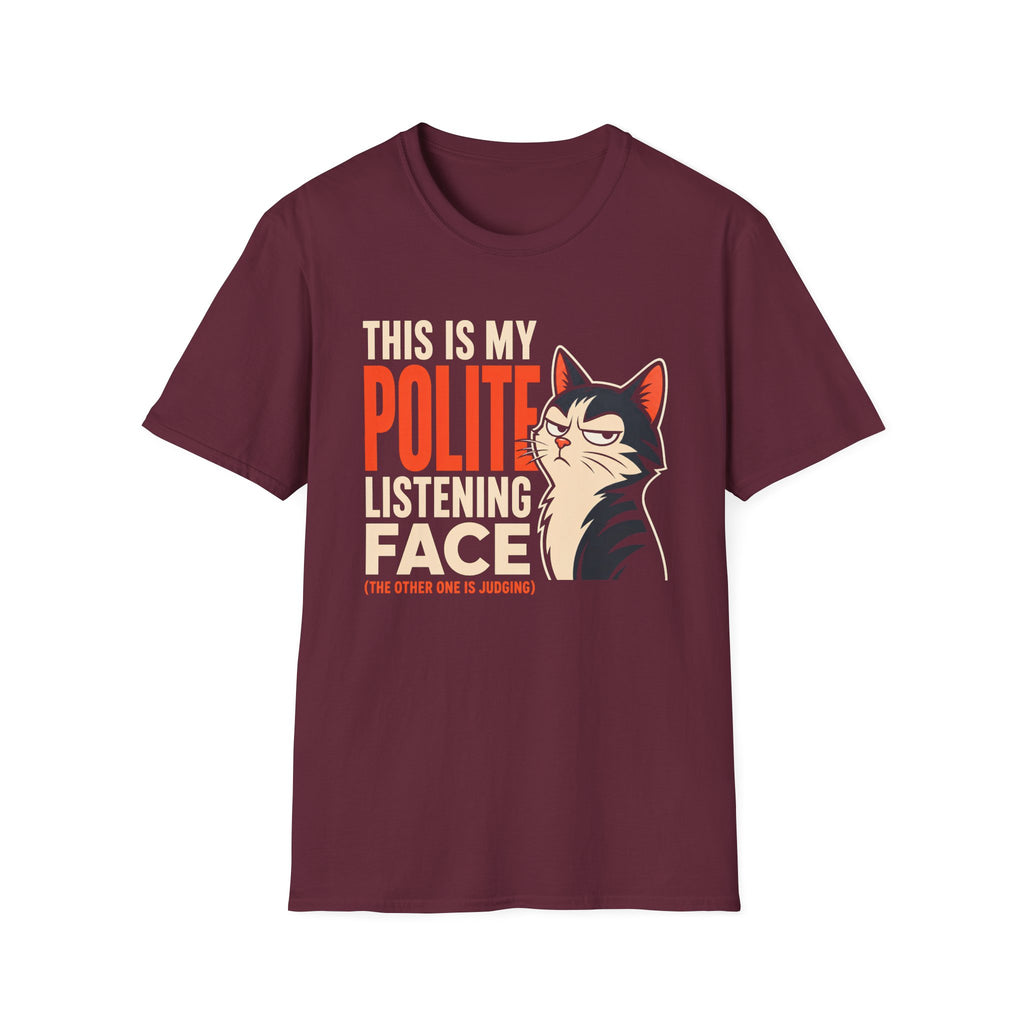 A maroon short-sleeve crewneck t-shirt with a graphic print on the front. The graphic features the text 'THIS IS MY POLITE LISTENING FACE' in white and orange lettering next to an illustration of a black and white cat with orange ears.