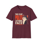 A maroon short-sleeve crewneck t-shirt with a graphic print on the front. The graphic features the text 'THIS IS MY POLITE LISTENING FACE' in white and orange lettering next to an illustration of a black and white cat with orange ears.