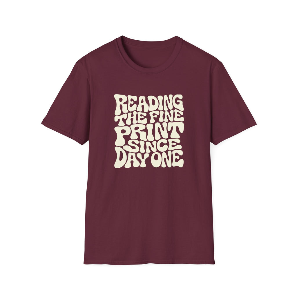 maroon t-shirt with text 'reading the fine print since day one'
