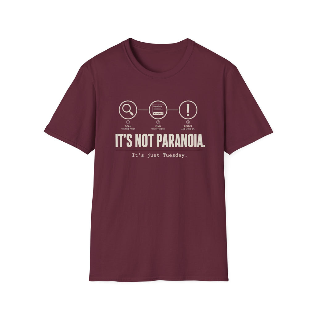 A maroon short-sleeve graphic T-shirt with  text 'it's not paranoia it's a tuesday'