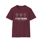 A maroon short-sleeve graphic T-shirt with  text 'it's not paranoia it's a tuesday'