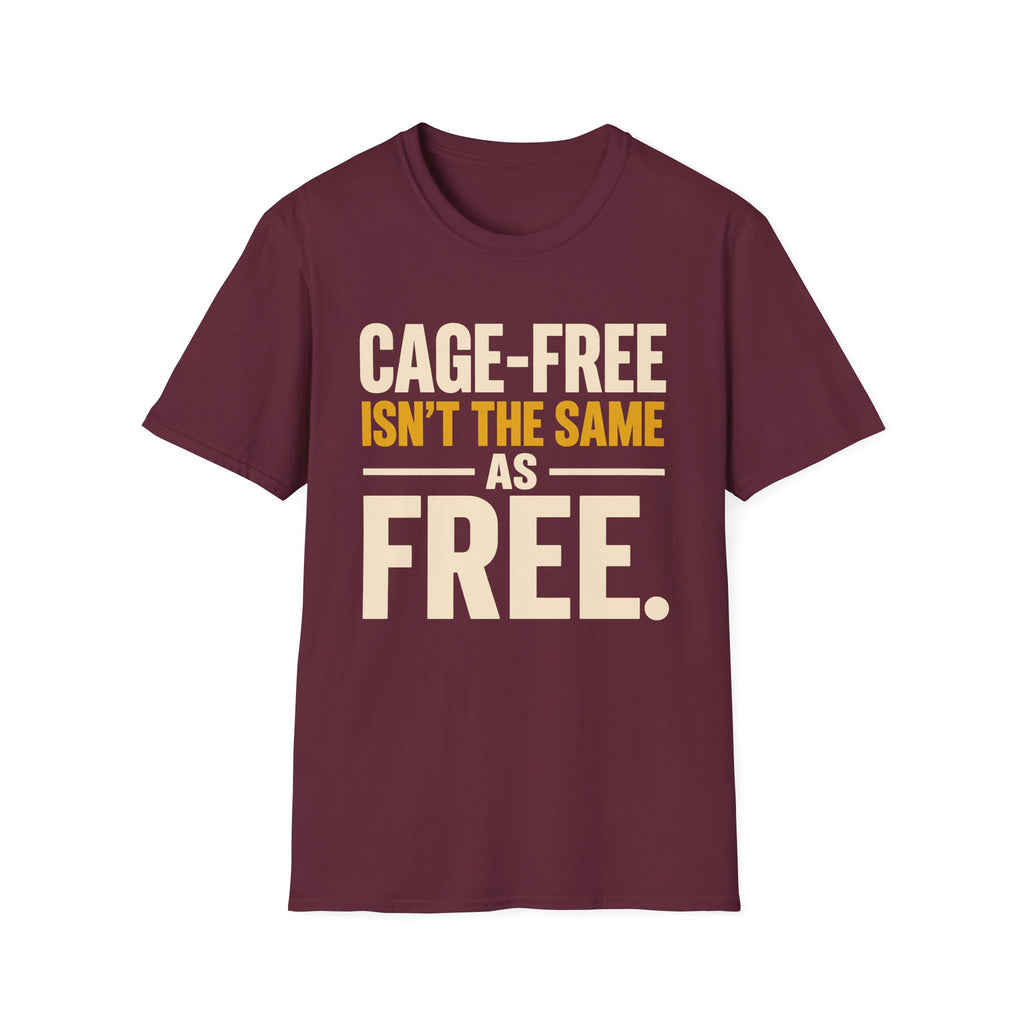 A maroon short-sleeve crewneck t-shirt with a graphic text print reading 'CAGE-FREE ISN'T THE SAME AS FREE.' in cream and mustard yellow lettering, displayed on a solid white background.
